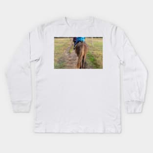 Brown pony croup with a long tail walking away Kids Long Sleeve T-Shirt